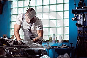 Man working in car workshop