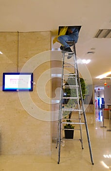 Man working on the ceiling