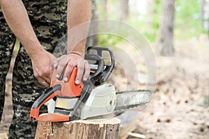 A man working a chainsaw