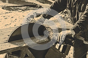 Man working with circular saw blade