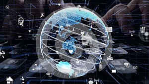 Man working on computer keyboard with graphic of internet networ