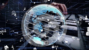 Man working on computer keyboard with graphic of internet networ