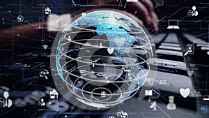 Man working on computer keyboard with graphic of internet networ