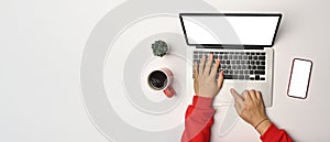 Man working with computer laptop computer on white table.