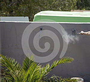 Man working on the construction of the printed concrete wall photo