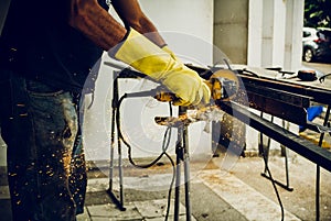 man working with construction tool photo