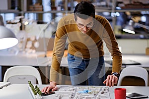 Man working in design and engineering architecture office