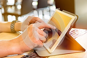Man working at digital tablet