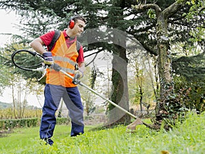 Man working edge trimmer