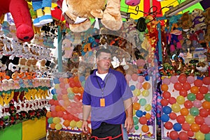 Man working at Fair or Carnival