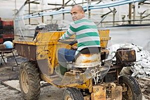 man working on Forklift loader