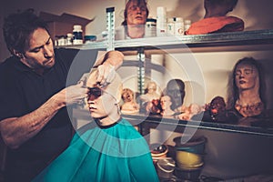 Man working in a fx workshop photo