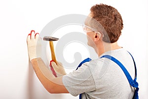 Man working with hammer