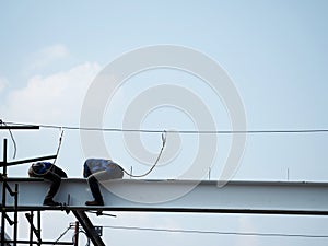 Man Working on the Working at height on construction