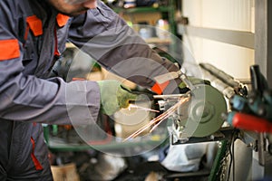Man working in his workshop.Manual worker.
