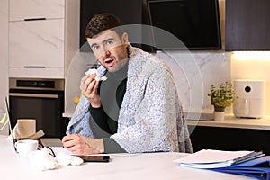 Man working from home with a cold