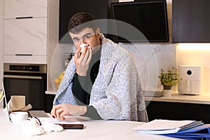 Man working from home with a cold