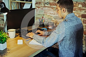 Man working from home during coronavirus or COVID-19 quarantine, remote office concept