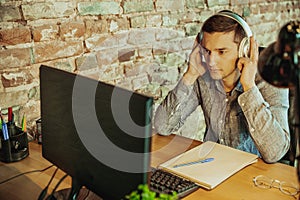 Man working from home during coronavirus or COVID-19 quarantine, remote office concept