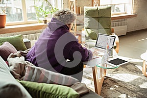 Man working from home during coronavirus or COVID-19 quarantine, remote office concept