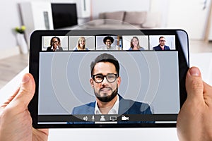 Man Working From Home Having Group Videoconference