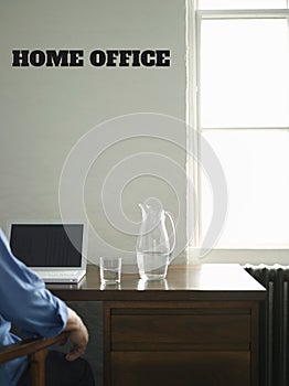 Man working from home with office set up