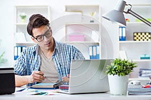 The man working from home in teleworking concept photo