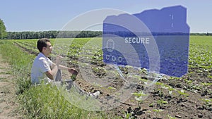 Man is working on HUD holographic display with text Secure on the edge of the field