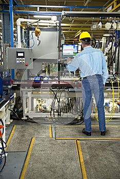 Man Working in Industrial Manufacturing Factory