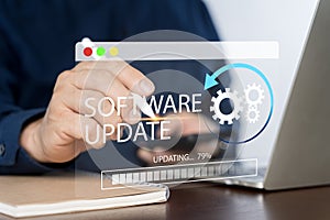 Man working and installing update process. Software updates or operating system upgrades to keep your device up