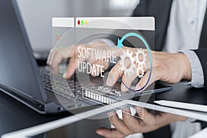 Man working and installing update process. Software updates or operating system upgrades to keep your device up