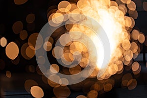 Man working on iron with grinder