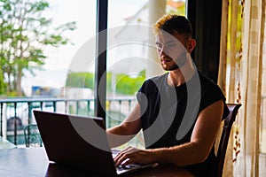 Man working with the laptop