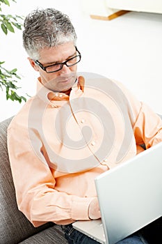 Man working with laptop computer