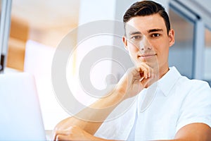 Man working on laptop at home