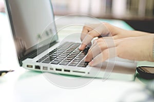 Man working on laptop.