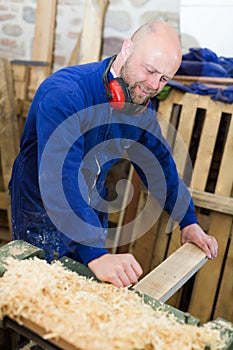 Man working on a machine at workshop