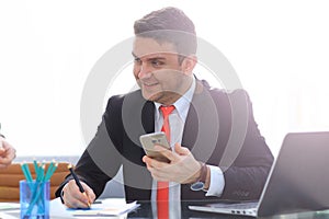 Man working at the office on laptop