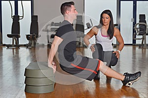 Man working out with his pesonal trainer