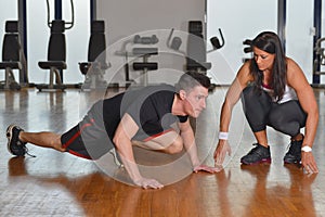 Man working out with his pesonal trainer