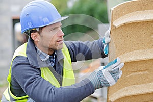 man working with pipes