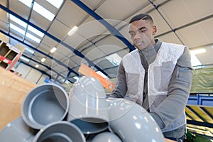 Man working at plant pipes