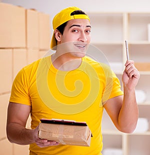 Man working in postal parcel delivery service office