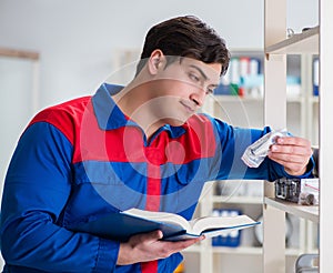 Man working in the postal warehouse