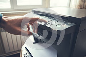 Man working in  print machine