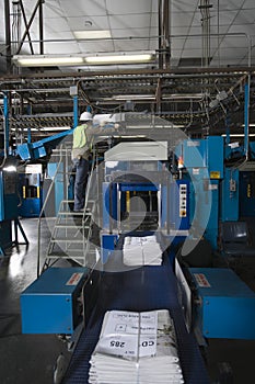Man Working In Printing Press Factory