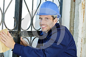 Man working sanding outdoors