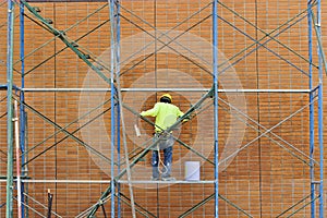 Man working on scaffolding.