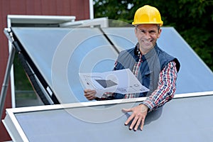 man working at solar panels