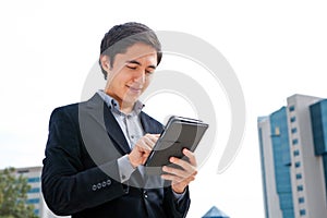 Man working on a touchscreen tablet computer